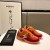 Chanel Men & Women Low-Top Sneakers Orange CHS-054